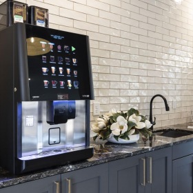 The essence of exceptional living a kitchen with a black refrigerator