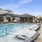 a swimming pool in front of a building