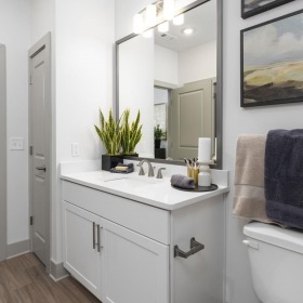Bathroom options with thoughtful details a bathroom with a large mirror