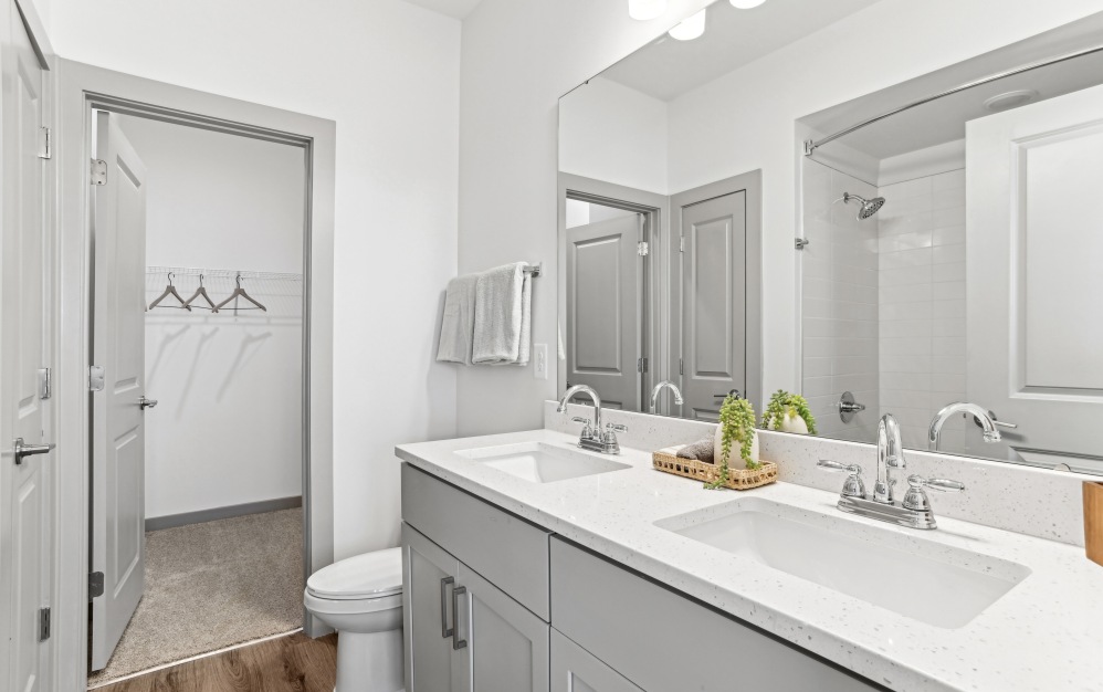 expansive primary bathroom with closet